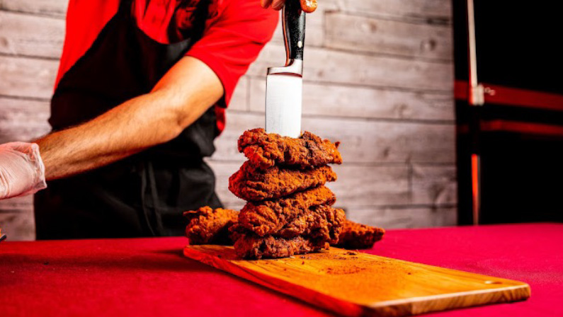 Thinking of what to pick between Nashville Hot Chicken vs Buffalo Chicken? We've got you covered! Here's your ultimate guide to these tasteful delights.